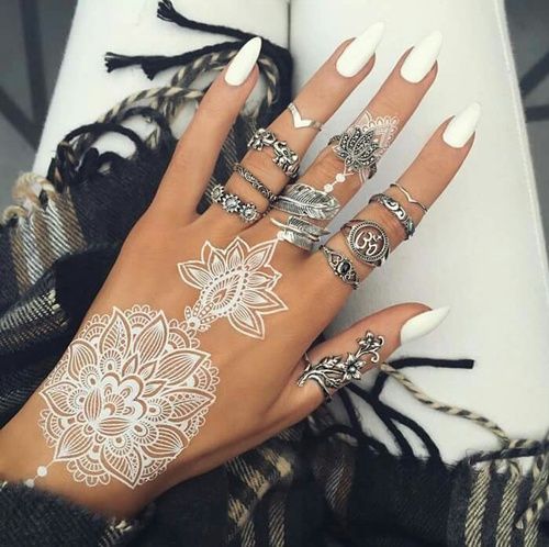 Jaw-Dropping White Henna
  Tattoos