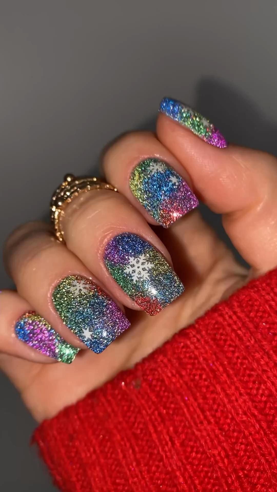 Galaxy-Inspired Glittery Nails
  Design