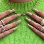 1688771138_Manicure-With-A-Tribal-Accent-Nail.jpg