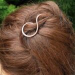 1688773554_Unusual-Twist-And-Pull-Apart-Hairstyle.jpg