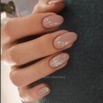 1688783218_Manicure-With-A-Tribal-Accent-Nail.jpg