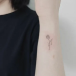 1688797558_Tulip-Tattoo-Ideas-For-Women.png