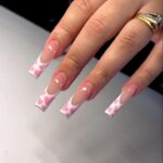 1688801282_Manicure-With-A-Tribal-Accent-Nail.jpg
