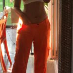 1688801834_Orange-Pants-Outfits.jpg