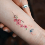 1688806734_herry-Blossom-Tattoo-Ideas-For-Women.png