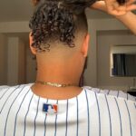1688813358_Men-Haircuts-For-Naturally-Curly-Hair.jpg