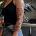 1688818626_Half-Sleeve-Tattoos-For-Women.jpg